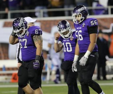 Kevin Burke and the Mount Union offense hangs its heads while leaving the field. (Photo by Steve Frommell, d3photography.com)